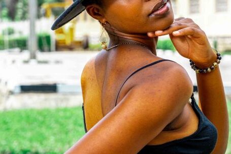 Sustainable Fashion - Portrait of African Woman Wearing a Hat