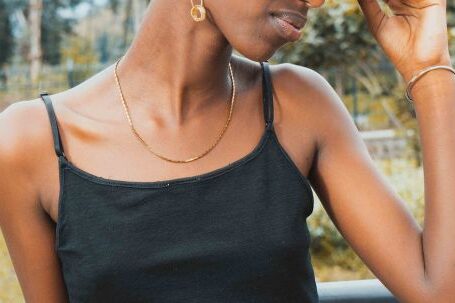 Budget Fashion - Portrait of African Woman Wearing a Hat