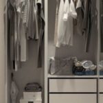 Closet Makeover - Assorted Clothes Hanged Inside Cabinet