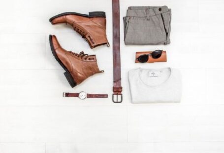 Clothing - pair of brown leather boots beside bet